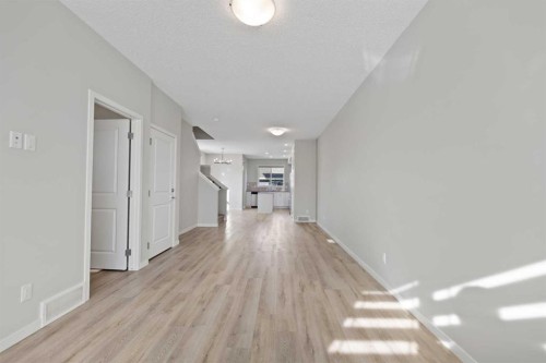 281 Creekside Boulevard Sw, Calgary, AB - Indoor Photo Showing Other Room