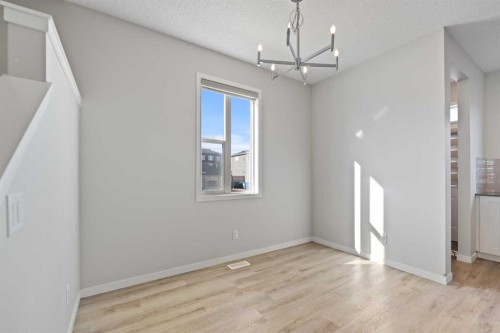 281 Creekside Boulevard Sw, Calgary, AB - Indoor Photo Showing Other Room