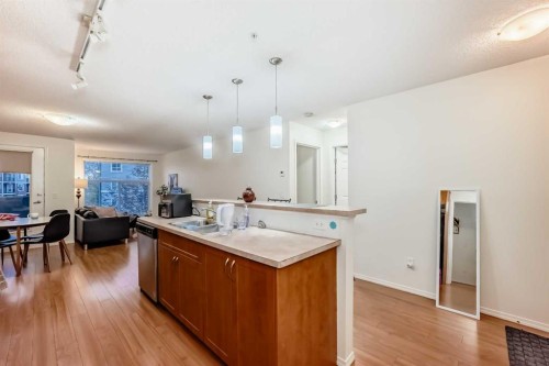2212-700 Willowbrook Road Nw, Airdrie, AB - Indoor Photo Showing Kitchen With Double Sink