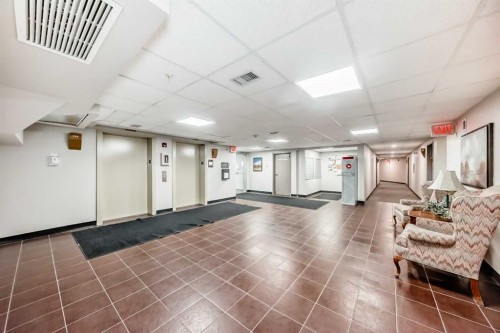 2212-700 Willowbrook Road Nw, Airdrie, AB - Indoor Photo Showing Other Room