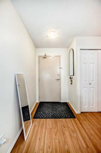2212-700 Willowbrook Road Nw, Airdrie, AB - Indoor Photo Showing Other Room