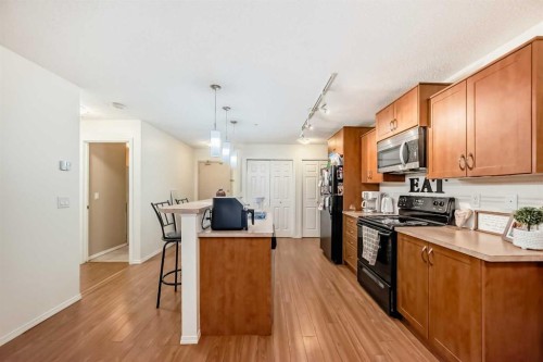 2212-700 Willowbrook Road Nw, Airdrie, AB - Indoor Photo Showing Kitchen