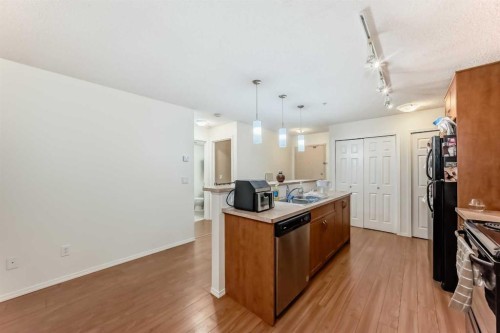 2212-700 Willowbrook Road Nw, Airdrie, AB - Indoor Photo Showing Kitchen With Double Sink