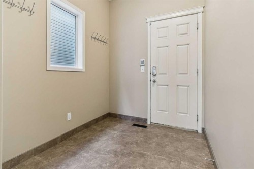 34 Kingsland Close, Airdrie, AB - Indoor Photo Showing Other Room