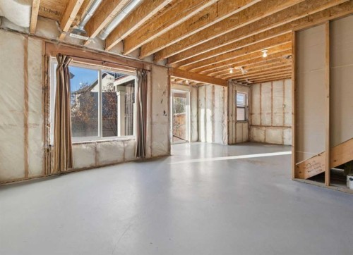 34 Kingsland Close, Airdrie, AB - Indoor Photo Showing Basement