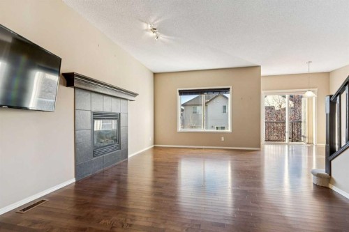 34 Kingsland Close, Airdrie, AB - Indoor With Fireplace