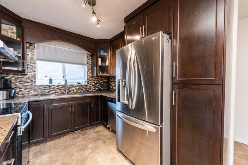 70 Martindale Boulevard Ne, Calgary, AB - Indoor Photo Showing Kitchen With Stainless Steel Kitchen With Double Sink
