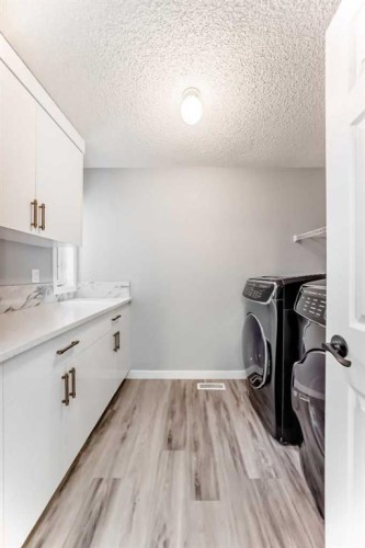 50 Hampstead Terrace Nw, Calgary, AB - Indoor Photo Showing Laundry Room