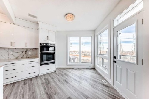 50 Hampstead Terrace Nw, Calgary, AB - Indoor Photo Showing Kitchen With Upgraded Kitchen