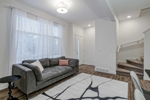 92 Walden Lane Se, Calgary, AB - Indoor Photo Showing Living Room