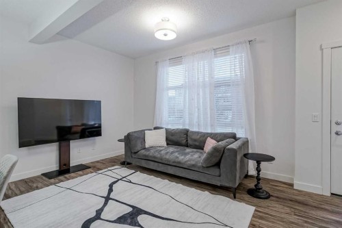 92 Walden Lane Se, Calgary, AB - Indoor Photo Showing Living Room