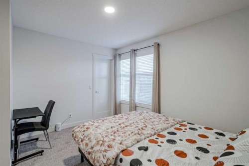 92 Walden Lane Se, Calgary, AB - Indoor Photo Showing Bedroom