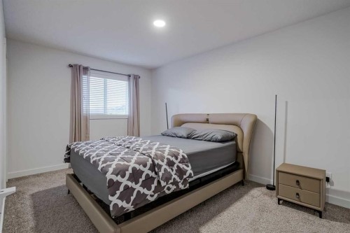 92 Walden Lane Se, Calgary, AB - Indoor Photo Showing Bedroom