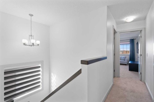 105 Everhollow Rise Sw, Calgary, AB - Indoor Photo Showing Other Room