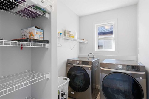 105 Everhollow Rise Sw, Calgary, AB - Indoor Photo Showing Laundry Room