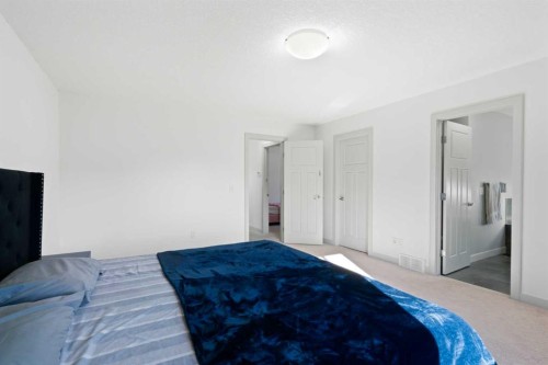 105 Everhollow Rise Sw, Calgary, AB - Indoor Photo Showing Bedroom