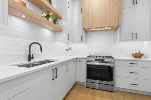 407 Patterson Boulevard Sw, Calgary, AB - Indoor Photo Showing Kitchen With Double Sink With Upgraded Kitchen