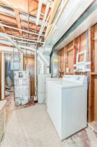 627 Seymour Avenue Sw, Calgary, AB - Indoor Photo Showing Laundry Room