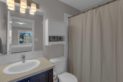 108-2400 Ravenswood View Se, Airdrie, AB - Indoor Photo Showing Bathroom