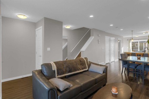 108-2400 Ravenswood View Se, Airdrie, AB - Indoor Photo Showing Living Room