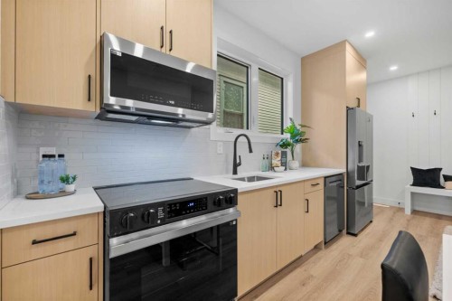2518 16B Street Sw, Calgary, AB - Indoor Photo Showing Kitchen With Stainless Steel Kitchen