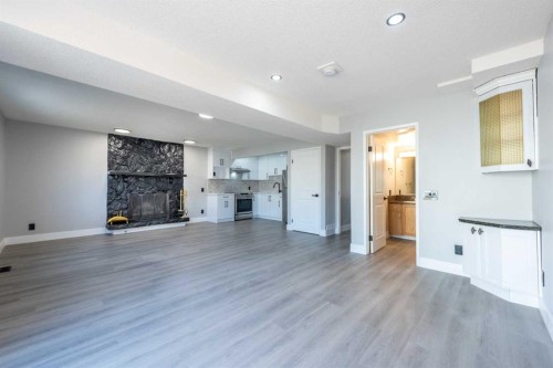 13 Martingrove Court Ne, Calgary, AB - Indoor With Fireplace