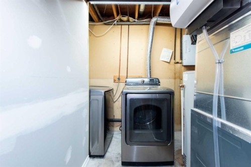 13 Martingrove Court Ne, Calgary, AB - Indoor Photo Showing Laundry Room