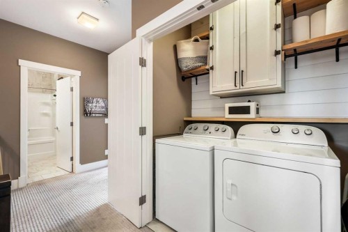 96 Beny-Sur-Mer Road Sw, Calgary, AB - Indoor Photo Showing Laundry Room