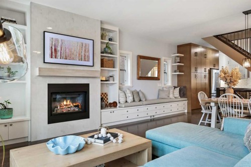 96 Beny-Sur-Mer Road Sw, Calgary, AB - Indoor Photo Showing Living Room With Fireplace