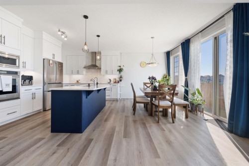 633 Windrow Manor Sw, Airdrie, AB - Indoor Photo Showing Kitchen With Upgraded Kitchen