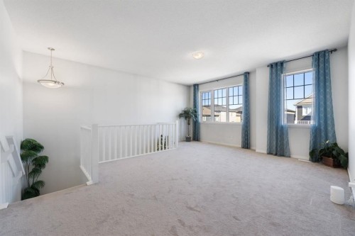 633 Windrow Manor Sw, Airdrie, AB - Indoor Photo Showing Other Room