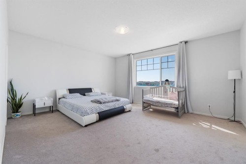 633 Windrow Manor Sw, Airdrie, AB - Indoor Photo Showing Bedroom