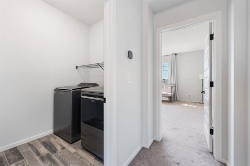 633 Windrow Manor Sw, Airdrie, AB - Indoor Photo Showing Other Room