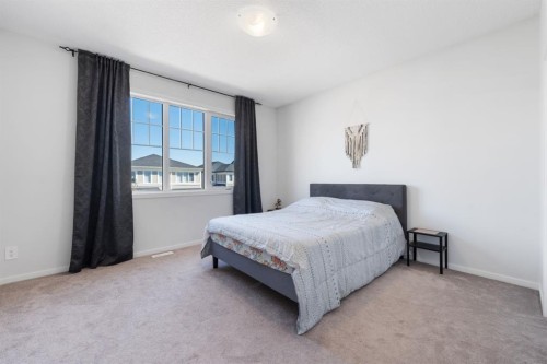 633 Windrow Manor Sw, Airdrie, AB - Indoor Photo Showing Bedroom