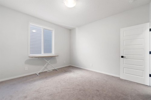 633 Windrow Manor Sw, Airdrie, AB - Indoor Photo Showing Other Room