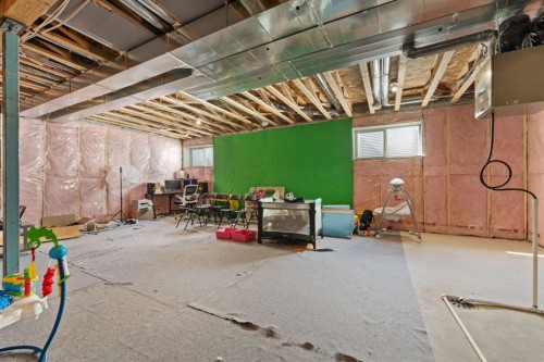 633 Windrow Manor Sw, Airdrie, AB - Indoor Photo Showing Basement