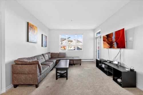 253-26 Val Gardena View Sw, Calgary, AB - Indoor Photo Showing Living Room