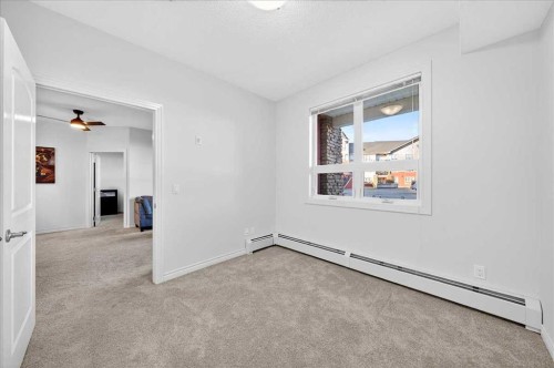 253-26 Val Gardena View Sw, Calgary, AB - Indoor Photo Showing Other Room