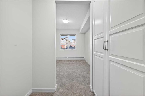 253-26 Val Gardena View Sw, Calgary, AB - Indoor Photo Showing Other Room