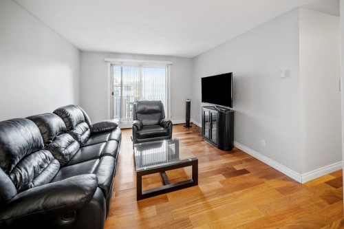 203-1719 11 Avenue Sw, Calgary, AB - Indoor Photo Showing Living Room