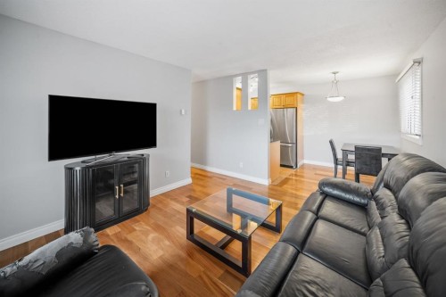 203-1719 11 Avenue Sw, Calgary, AB - Indoor Photo Showing Living Room