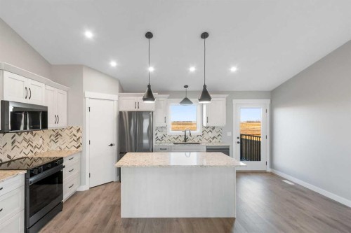 3422 Victory Way, Olds, AB - Indoor Photo Showing Kitchen With Upgraded Kitchen