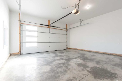 3422 Victory Way, Olds, AB - Indoor Photo Showing Garage
