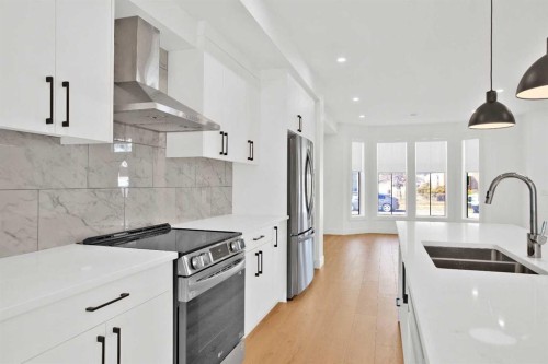 2514 16A Street Se, Calgary, AB - Indoor Photo Showing Kitchen With Stainless Steel Kitchen With Double Sink With Upgraded Kitchen