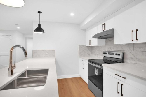2514 16A Street Se, Calgary, AB - Indoor Photo Showing Kitchen With Double Sink With Upgraded Kitchen