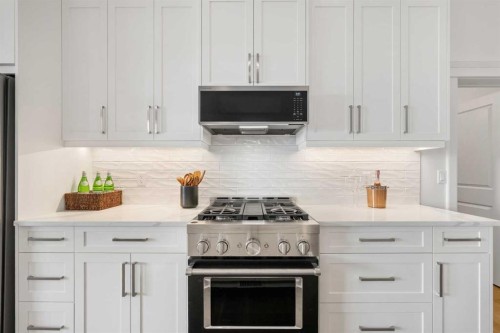 218 Mitchell Heath Nw, Calgary, AB - Indoor Photo Showing Kitchen With Upgraded Kitchen