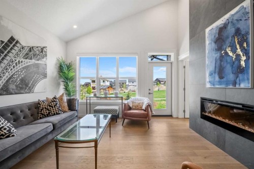 218 Mitchell Heath Nw, Calgary, AB - Indoor Photo Showing Living Room With Fireplace