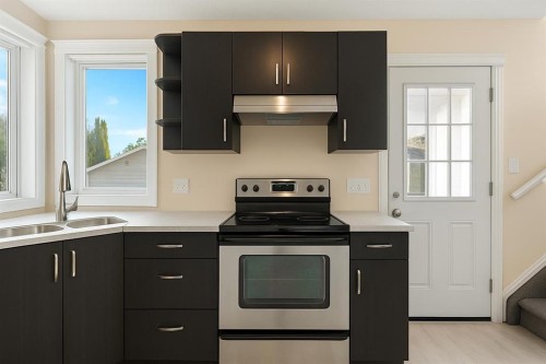 141 Tuscany Valley Green, Calgary, AB - Indoor Photo Showing Kitchen