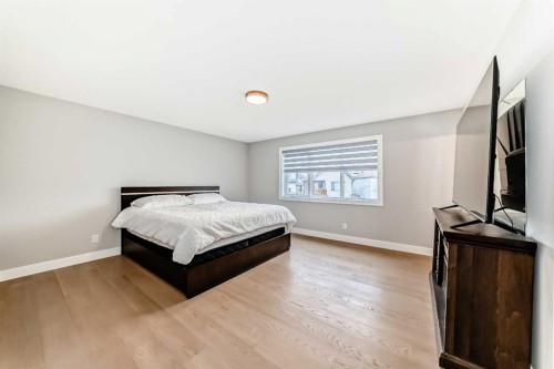 24 Copperfield Manor Se, Calgary, AB - Indoor Photo Showing Bedroom