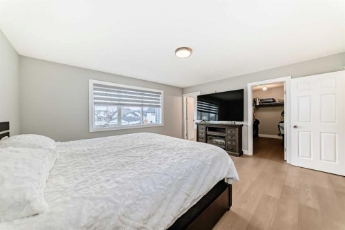 24 Copperfield Manor Se, Calgary, AB - Indoor Photo Showing Bedroom